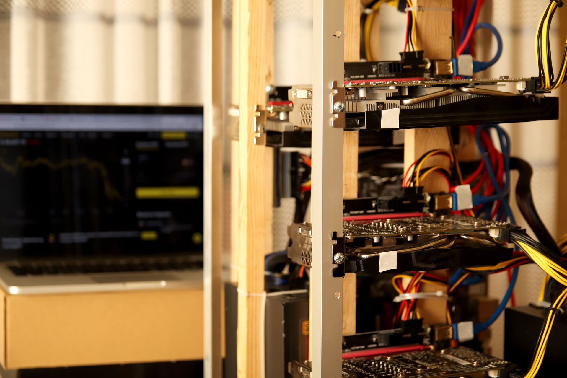 Homemade cryptocurrencies mining farm. Bitcoin and other cryptocurrencies mining farm featuring GPU graphic cards rig for cryptocurrency mining